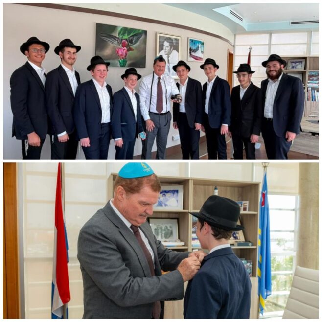 Aruba Prime Minister Wraps Tefillin With Chicago Bochurim